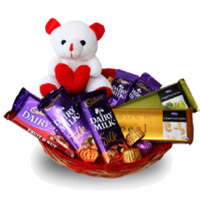 Send Newborn Gifts to India. Deliver Dairy Milk, Silk, Temptation Chocolates in India and 6 Inch Teddy Basket