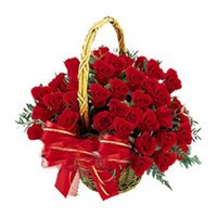 New Born Flowers Delivery to India. Red Roses Basket 24 Flowers to Bhopal