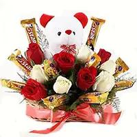 Dussehra Gifts to India. Send 36 Red White Roses to India with 16 Pcs Ferrero Rocher Bouquet on Dussehra