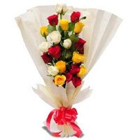 Send Mix Roses Bouquet in Crepe Wrap 12 flowers with Rakhi to India