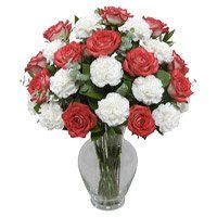 Send Flowers to Jagadhri and order for the best Red Rose White Carnation Vase 18 Flowers to Jagadhri