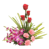 Send Diwali Flowers to India. Orchids, Roses, Carnation Basket of 12 Flowers to India