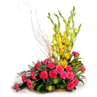 Rakhi Flower Delivery with 18 Pink Carnation and 6 Yellow Glad Basket Flowers