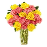 Send Rakhi with Flowers to India. Online Pink Carnation Yellow Rose in Vase 24 Flowers to India