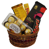 Online Gifts Delivery in Madurai. Chocolate Basket of Ferrero Rocher, Bournville, Mars, Temptation, Toblerone Chocolates in India