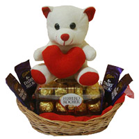 Deliver Diwali Gifts to Trichy. 4 Dairy Milk 16 Ferrero Rocher Diwali Chocolates to India and 6 Inch Teddy Basket