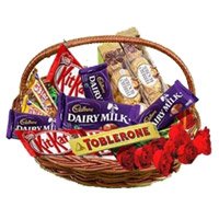 Online Order for Basket of Assorted Chocolate and 10 Red Roses as Diwali Gifts in India