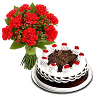 Send 12 Red Carnation with 1/2 Kg Black Forest Cakes to India. Diwali Cakes to India