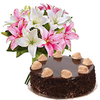 Get Rakhi Gifts to India. 6 Pink White Lily 1 Kg Chocolate Cake in India From 5 Star Hotel