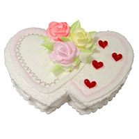 Order Online Rakhi with 2 Kg Double Heart Shape Pineapple Cakes to India