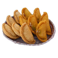 Best Wedding Gifts to India comprising 500 gm Gujiya as Wedding Sweets to India