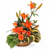 Order Online 3 Orange Lily 6 Orange Roses Basket 12 Rakhi Flowers to India
