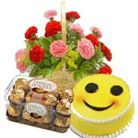 Online Rakhi Delivery of 15 Red Pink Carnation Basket with 16 pcs Ferrero Rocher and 1 Kg Smiley Cakes in India