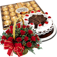 Send 24 Red Roses Basket with 0.5 Kg Black Forest Cake and 24 pcs Ferrero Rocher Chocolate to India. Rakhi Gifts to India