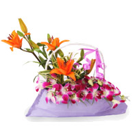 Send 9 Orchids 3 Lily Arrangement of Diwali Flowers to India