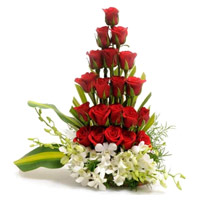 Online Flower Delivery of 4 Orchids 20 Arrangement of Roses in India