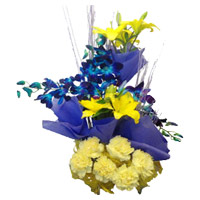 Fresh Flower Delivery in India. 4 Yellow Lily 4 Blue Orchids 6 Yellow Carnation Basket on Rakhi