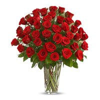 Diwali Flowers Delivery in India. Red Roses in Vase 75 Flowers in India