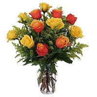 Send Yellow Orange Roses Vase 12 Flowers in India. New Born Flowers to India