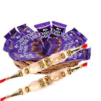 Send Rakhi with 12 Dairy Milk Chocolate Basket With 1 Red Rose Flowers and Rakhi Gifts to India