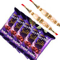 Order 5 Cadbury Silk Bubbly Chocolate With 3 White Roses with rakhi Delivery in India