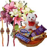 Deliver 6 Pink White Lily with 6 Inches Teddy and Chocolate Basket Gifts in India on Rakhi