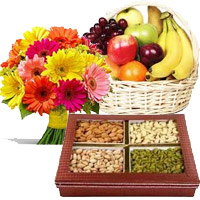 Diwali Gifts to Manipal. Online Delivery of 12 Mix Gerberas, 3 Kg Fresh Fruit Basket, 0.5 Kg Mixed Dry Fruits India for Diwali