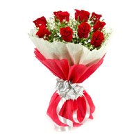 Best Durga Puja Flowers to India. Red Rose Bouquet in Crepe 12 Flowers in India